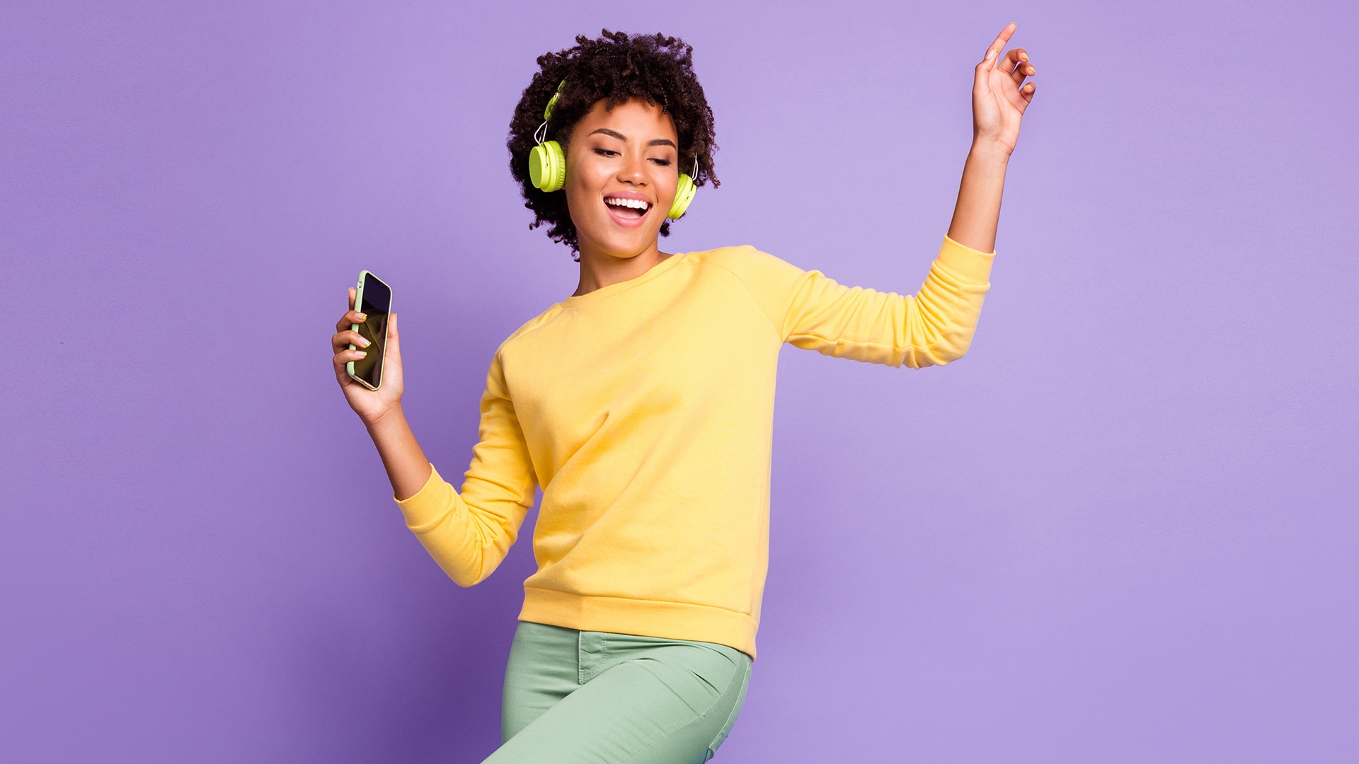 trendy stylish woman listening to music on app shows why music matters.